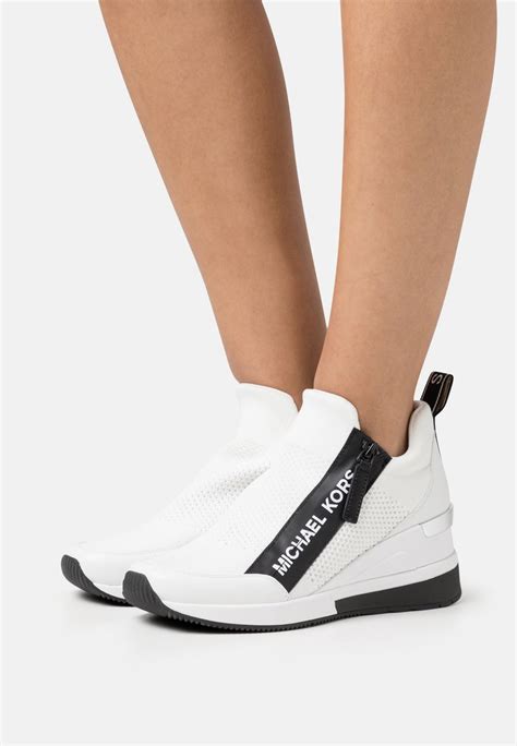 michael kors women's white sneakers|Michael Kors white wedge sneakers.